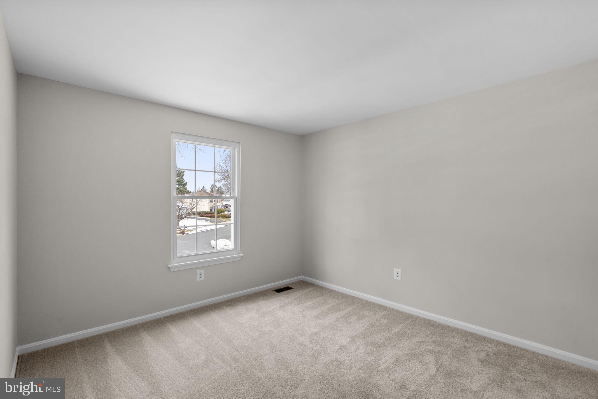 8 Seville Way Gaithersburg, MD 20878 - Photo 20 of 45 an empty room with a window