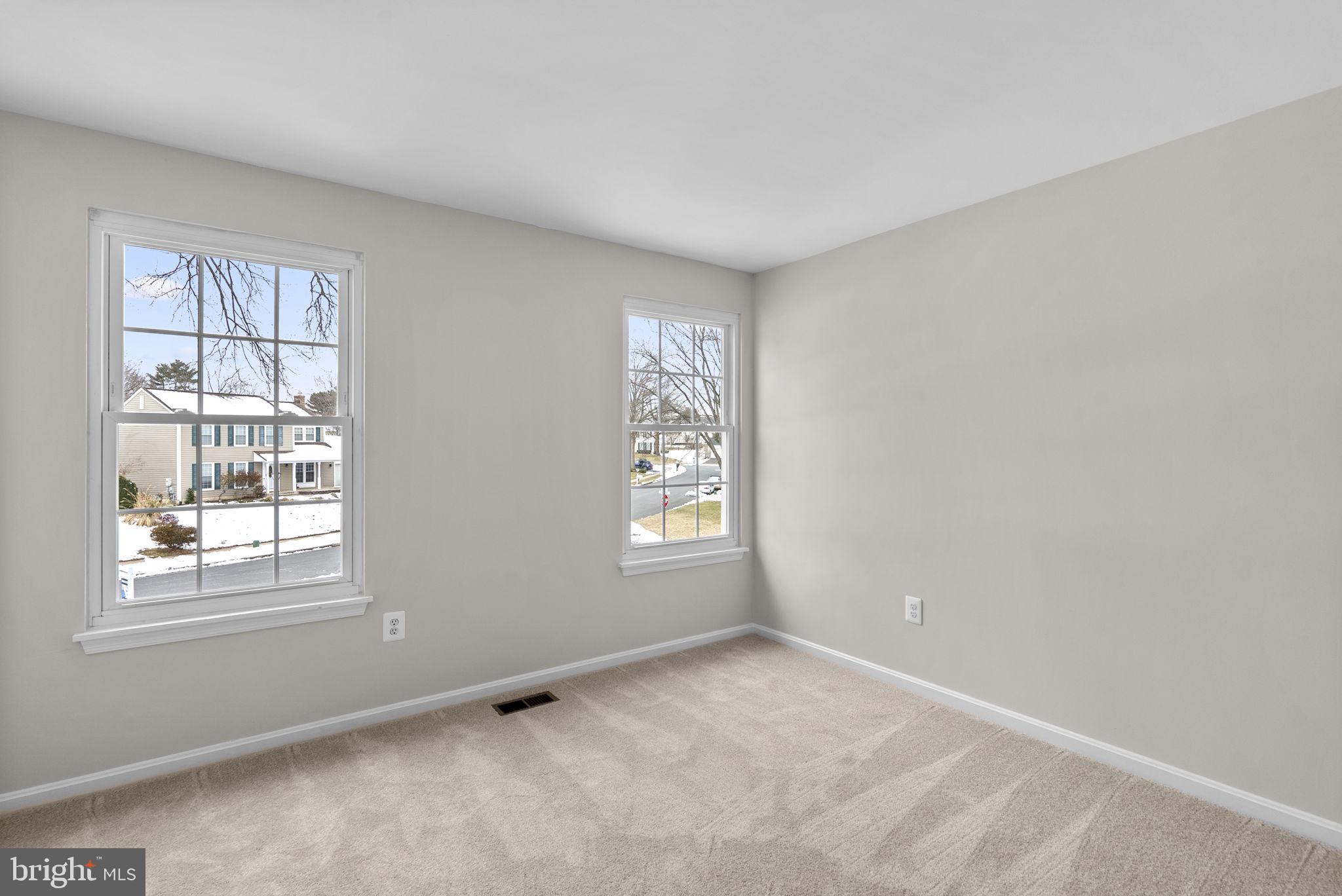 8 Seville Way Gaithersburg, MD 20878 - Photo 21 of 45 a view of an empty room with a window