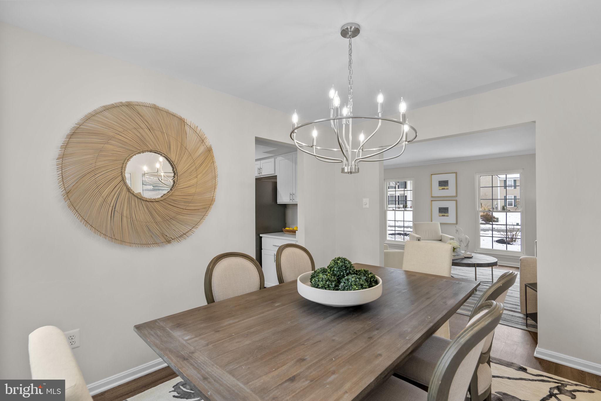 8 Seville Way Gaithersburg, MD 20878 - Photo 7 of 45 a view of a dining room with furniture