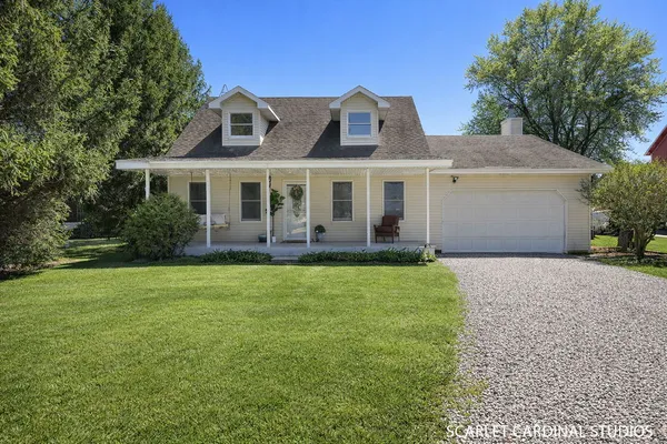 front view of a house with a yard