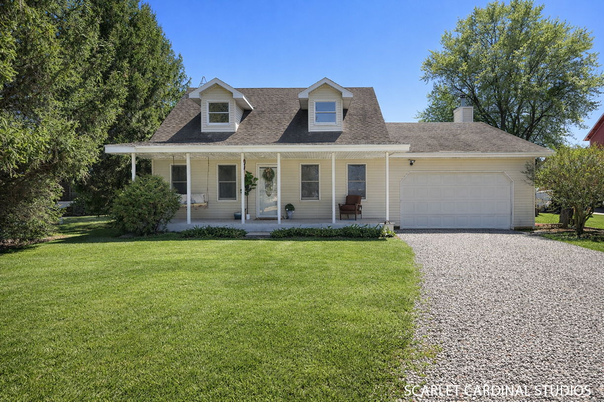 front view of a house with a yard