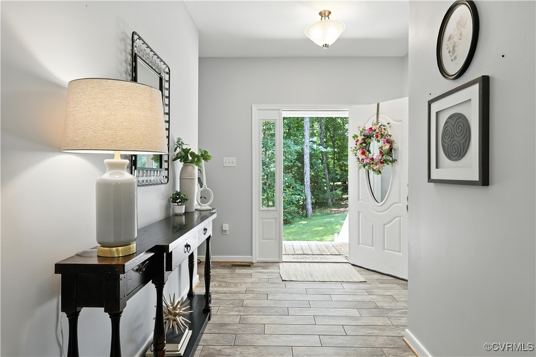 4290 Three Chopt Road Gum Spring, VA 23065 - Photo 12 of 32 a view of a hallway with furniture and entryway