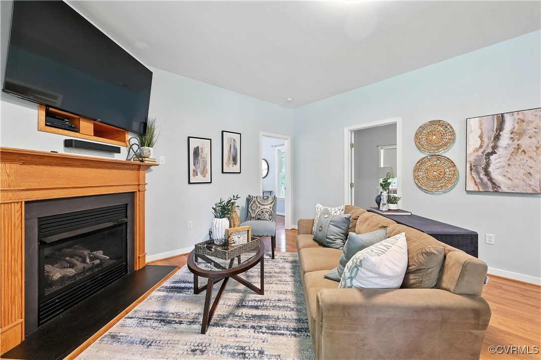 4290 Three Chopt Road Gum Spring, VA 23065 - Photo 17 of 32 a living room with furniture and a fireplace