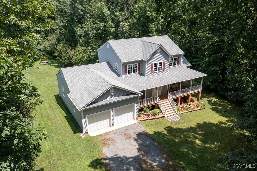 4290 Three Chopt Road Gum Spring, VA 23065 - Photo 2 of 32 a view of a house with a yard patio and deck