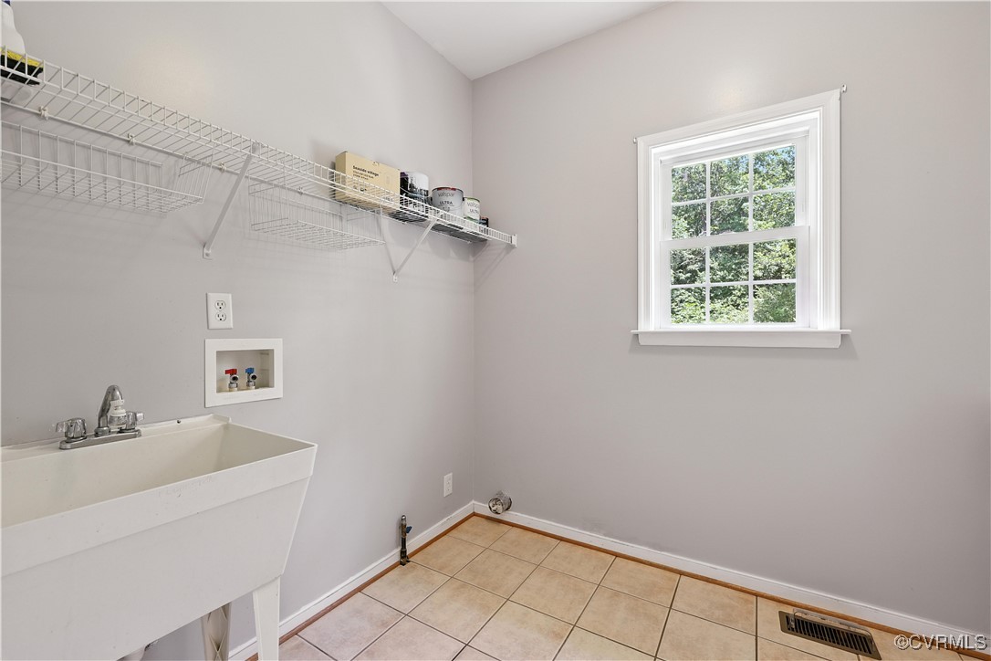 4290 Three Chopt Road Gum Spring, VA 23065 - Photo 26 of 32 a bathroom with a bathtub and shower