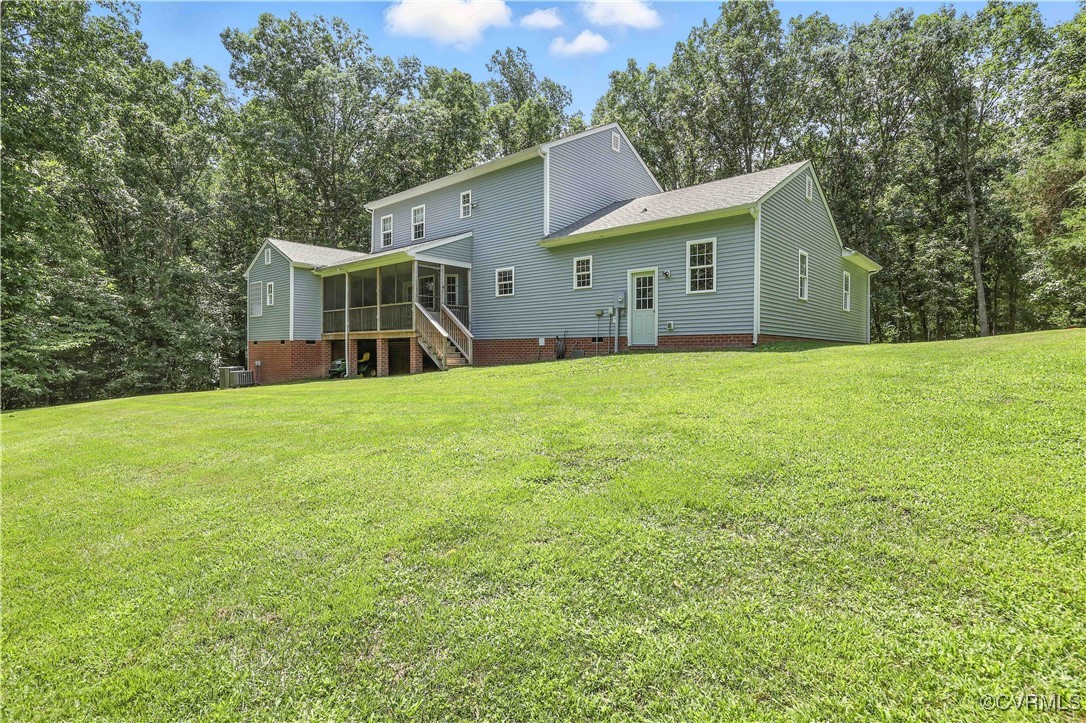 4290 Three Chopt Road Gum Spring, VA 23065 - Photo 6 of 32 a view of a house with a yard and sitting area