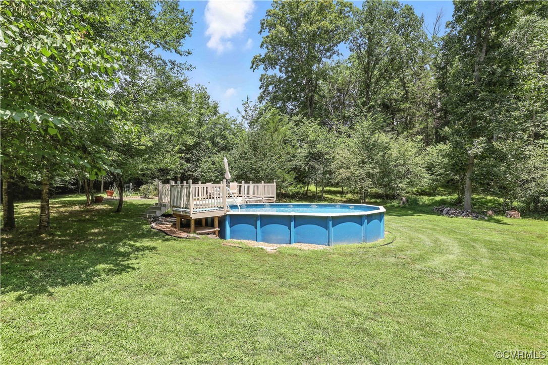 4290 Three Chopt Road Gum Spring, VA 23065 - Photo 8 of 32 a view of a house with a yard