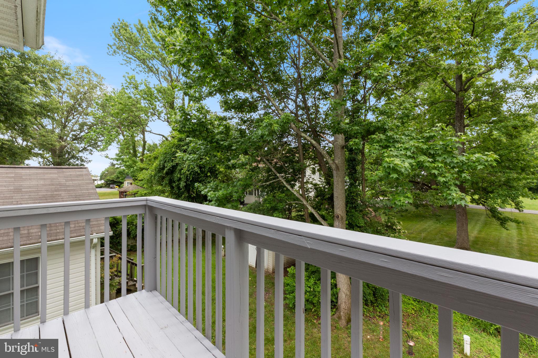 1527 Lincoln Road Shady Side, MD 20764 - Photo 23 of 30 a view of balcony with deck and garden
