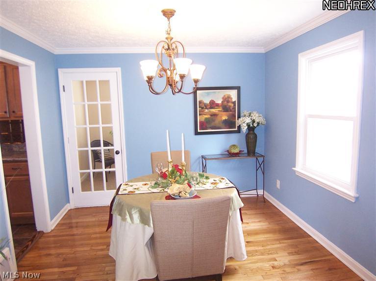 4089 Bushnell Road University Heights, OH 44121 - Photo 5 of 25 Formal Dining with Crown Molding
