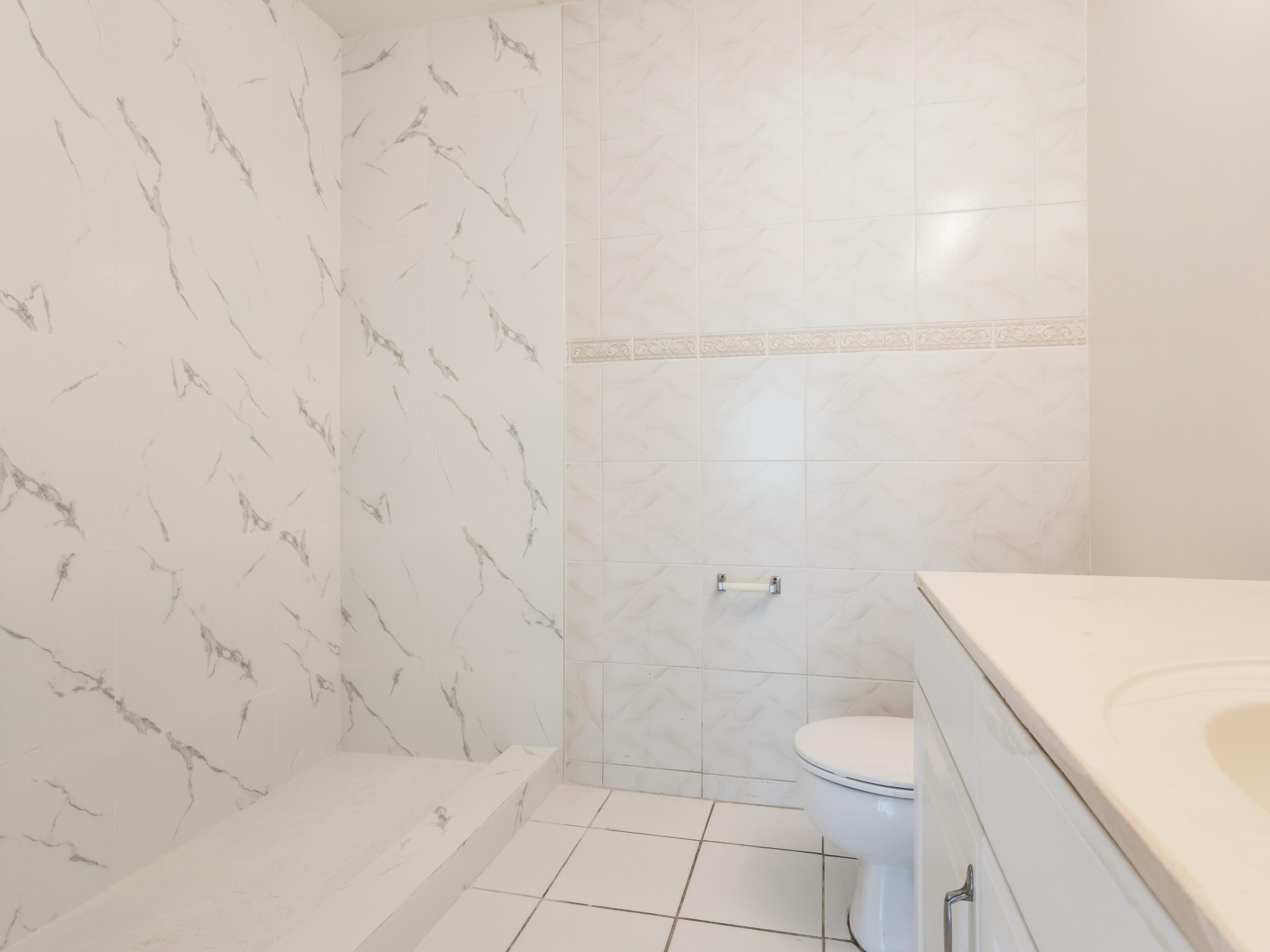 4806 Cherry Road West Palm Beach, FL 33417 - Photo 22 of 28 Guest Bathroom