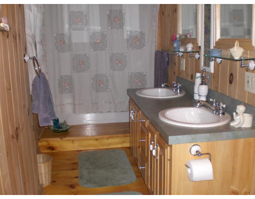 96 Rice Corner Road Brookfield, MA 01506 - Photo 15 of 23 a bathroom with a sink and a mirror