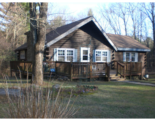 96 Rice Corner Road Brookfield, MA 01506 - Photo 2 of 23 a view of a yard in front of house