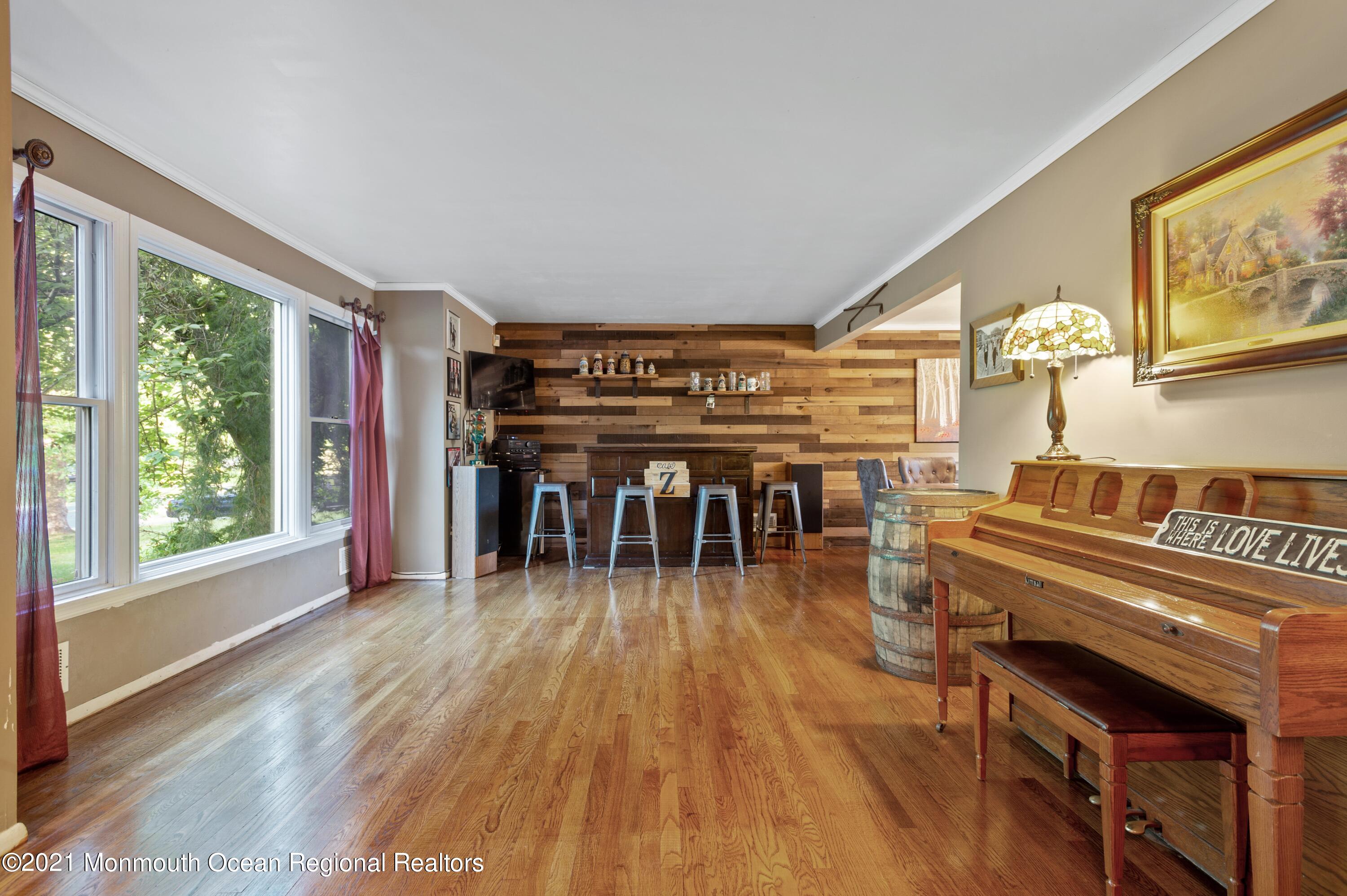 131 Bar Harbor Road Freehold, NJ 07728 - Photo 11 of 31 a view of a livingroom with furniture window and outside view