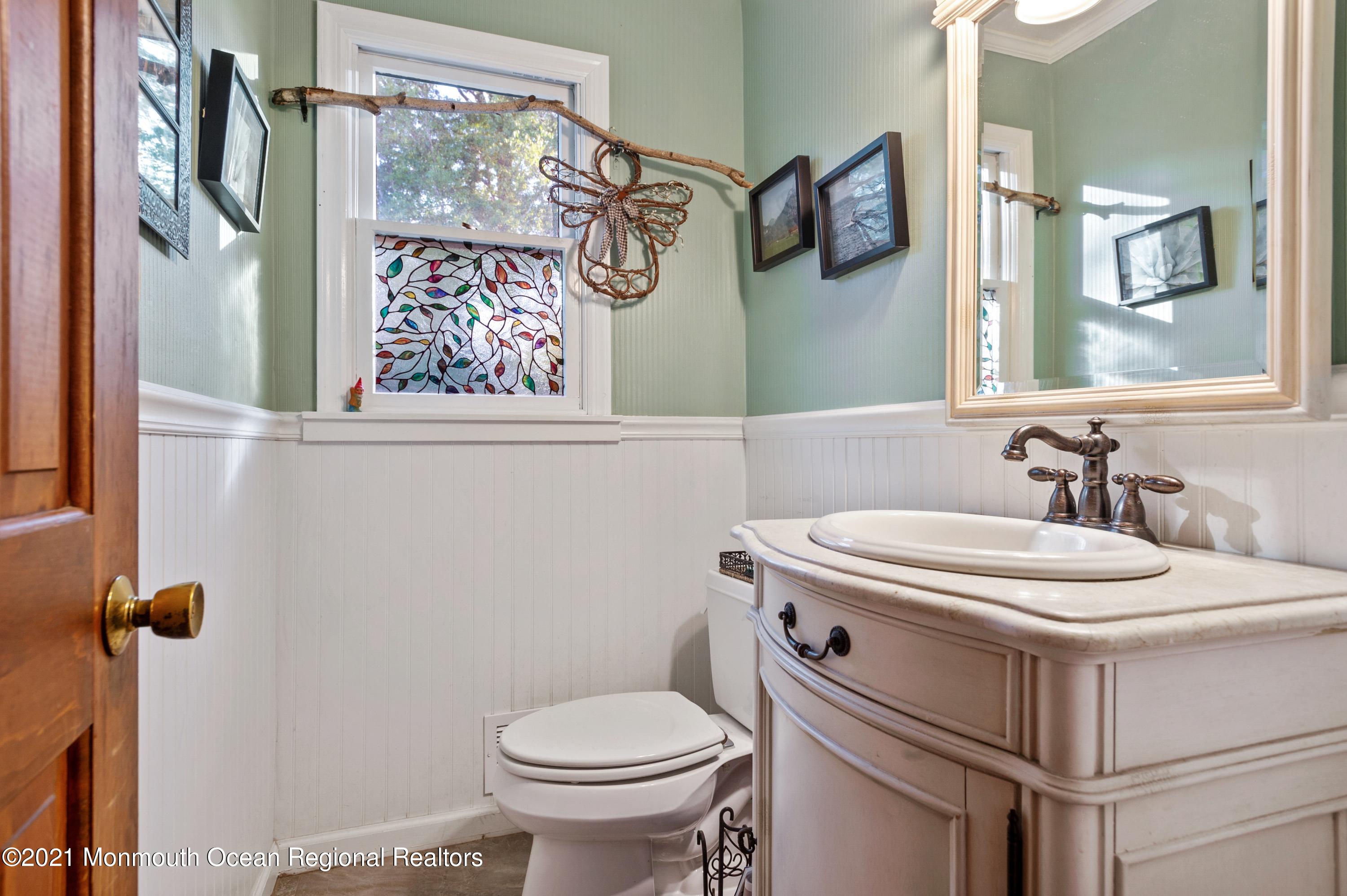 131 Bar Harbor Road Freehold, NJ 07728 - Photo 20 of 31 a bathroom with a sink and a toilet