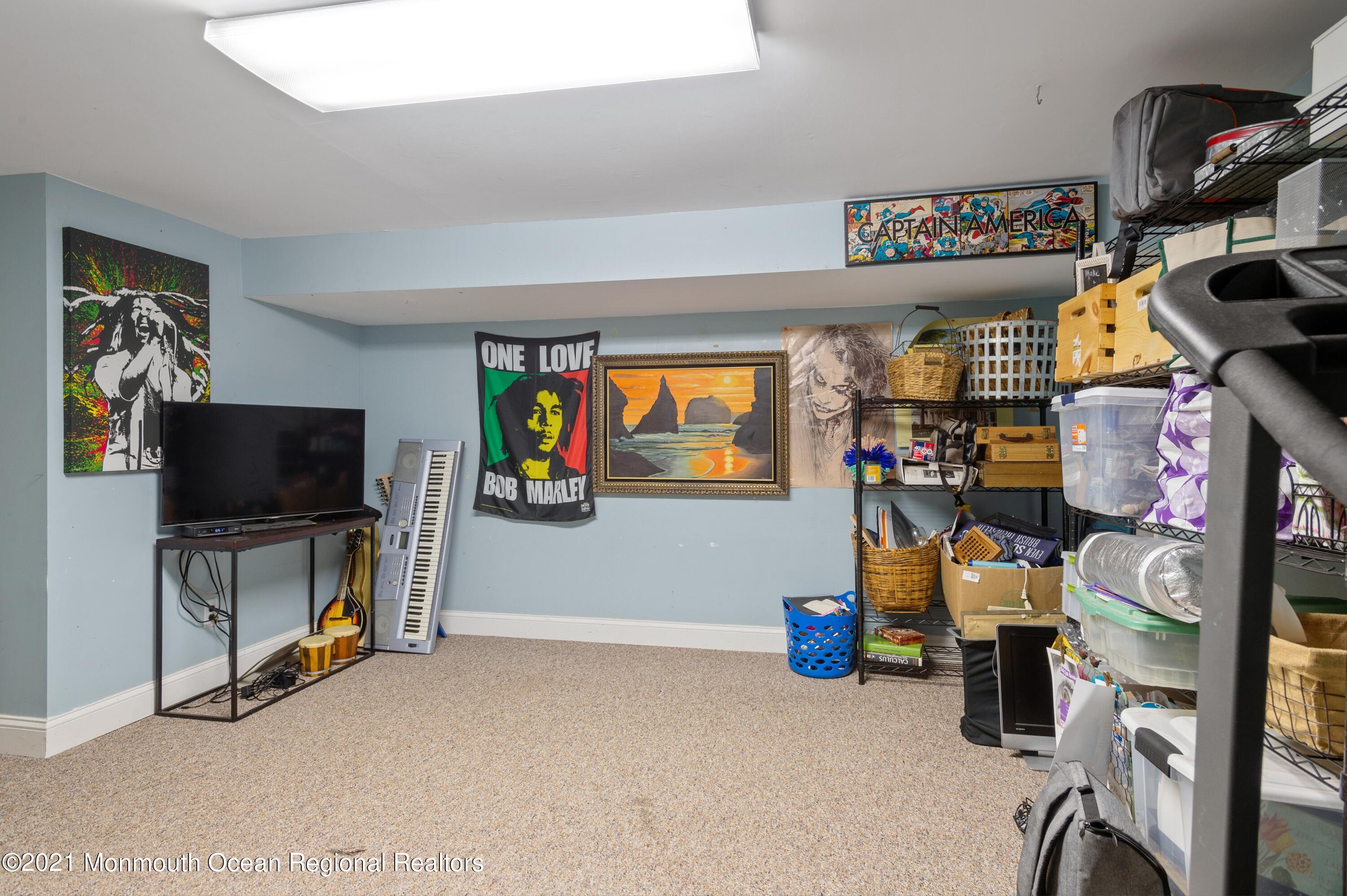 131 Bar Harbor Road Freehold, NJ 07728 - Photo 23 of 31 a view of a room with gym equipment