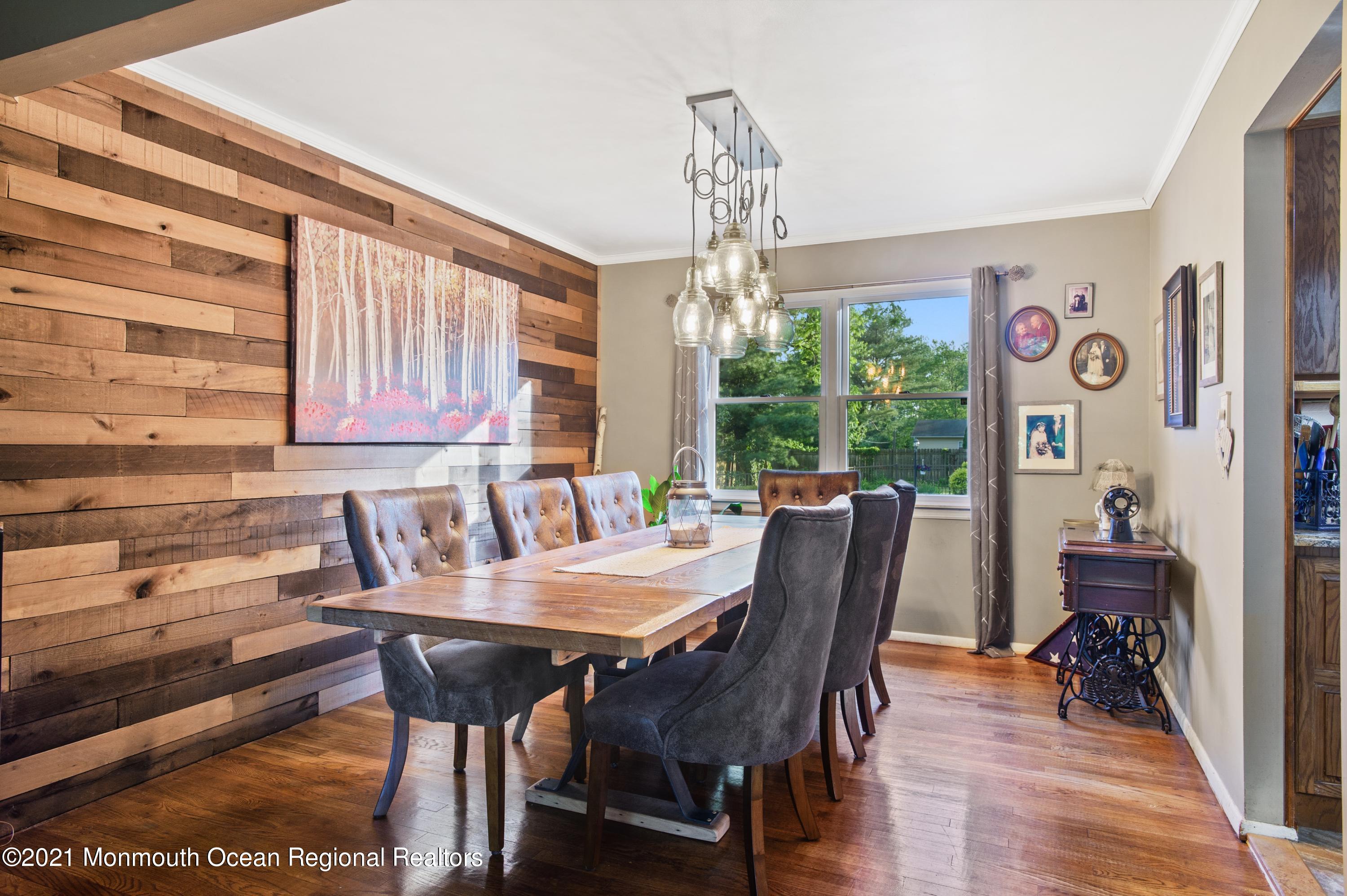 131 Bar Harbor Road Freehold, NJ 07728 - Photo 6 of 31 a view of a dining room with furniture window and outside view