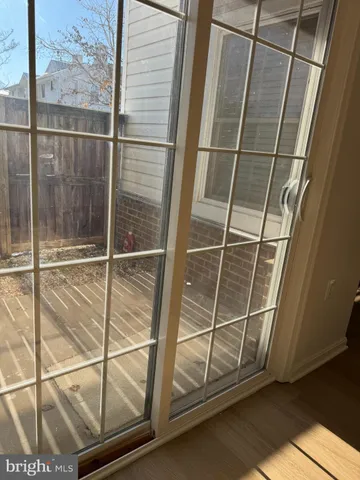 a bathroom with a glass door shower