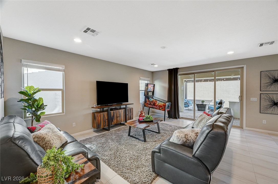 12898 Slipknot Street Las Vegas, NV 89141 - Photo 11 of 41 Great room with large sliding doors allowing plenty of daylight