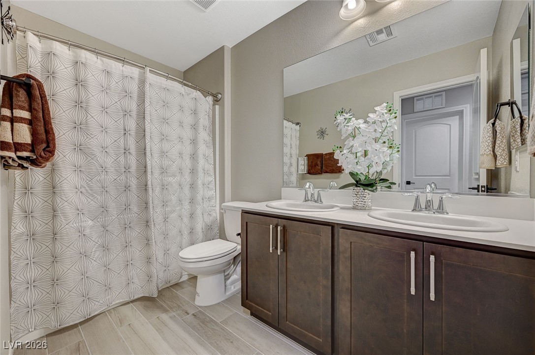 12898 Slipknot Street Las Vegas, NV 89141 - Photo 31 of 41 Upstairs Bathroom