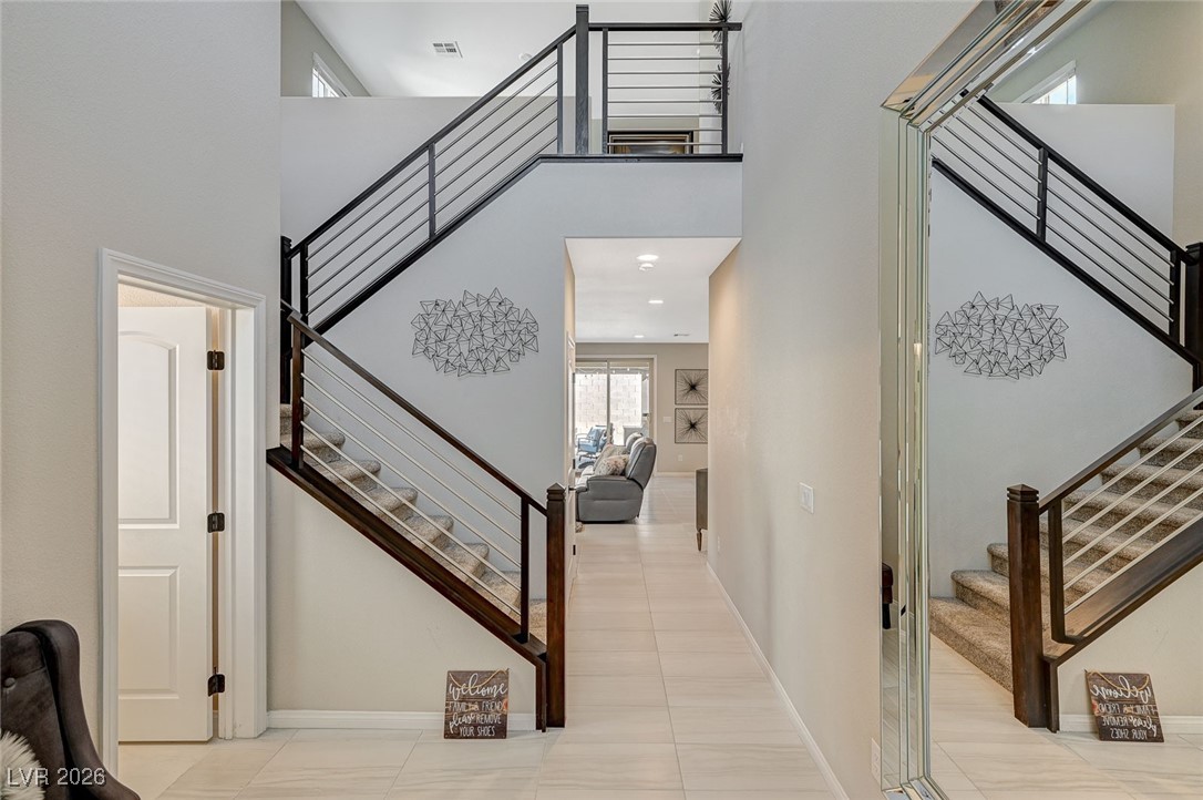 12898 Slipknot Street Las Vegas, NV 89141 - Photo 9 of 41 Modern entry with upgraded staircase