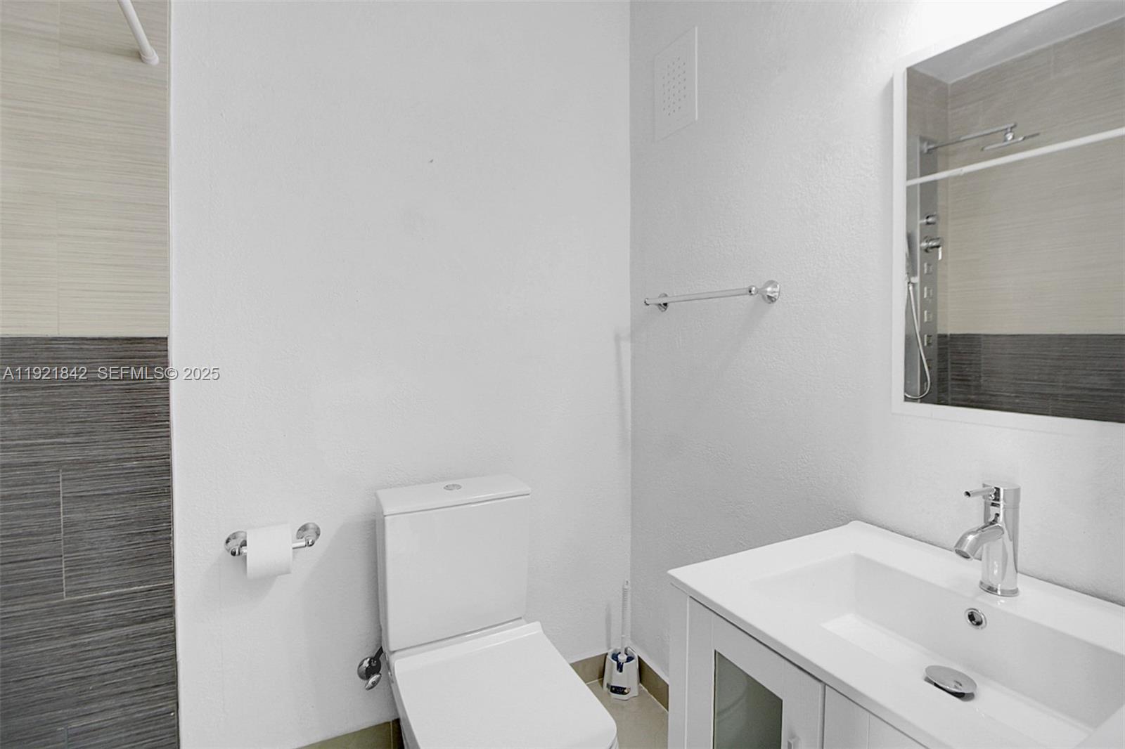 15251 Southwest 56th Terrace Miami, FL 33193 - Photo 20 of 29 a bathroom with a sink and a toilet
