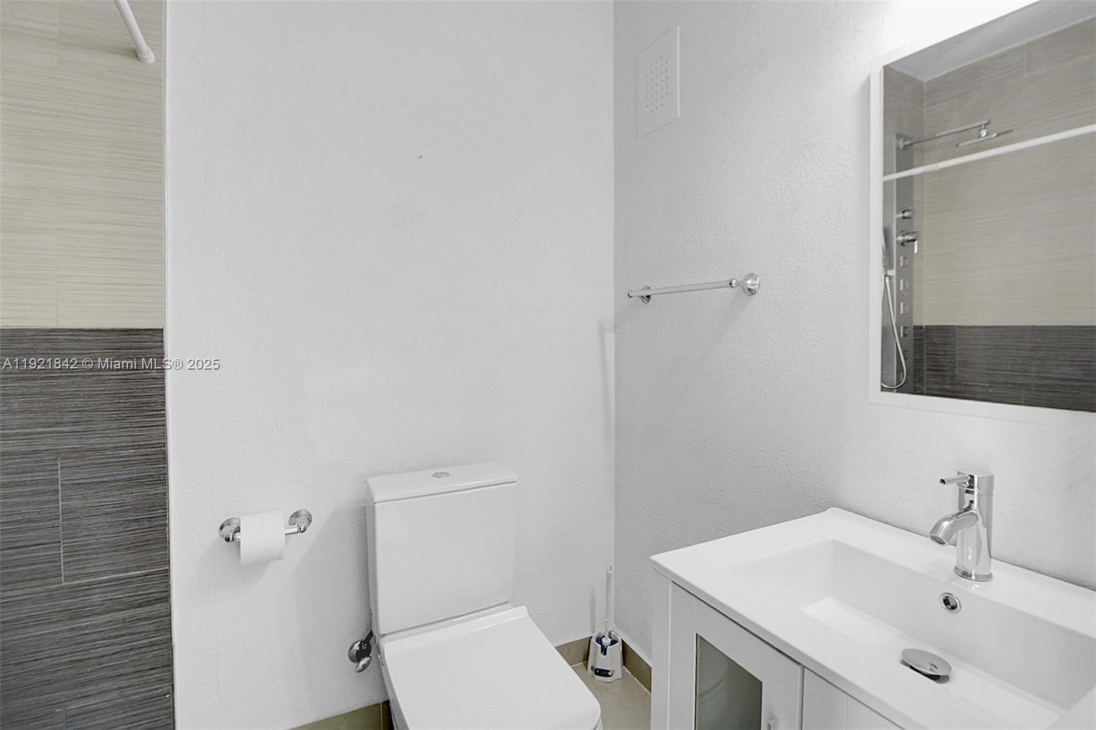 15251 Southwest 56th Terrace Miami, FL 33193 - Photo 20 of 29 a bathroom with a sink and a toilet
