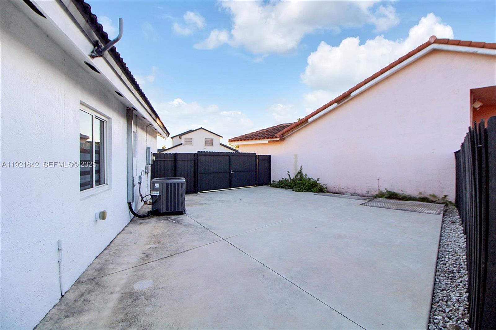 15251 Southwest 56th Terrace Miami, FL 33193 - Photo 25 of 29 a view of a house with a street