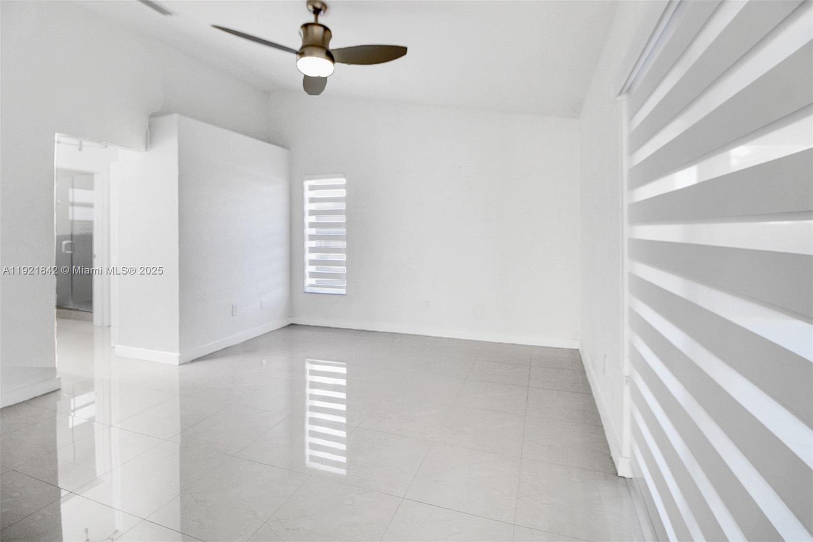 15251 Southwest 56th Terrace Miami, FL 33193 - Photo 6 of 29 a view of empty room with windows
