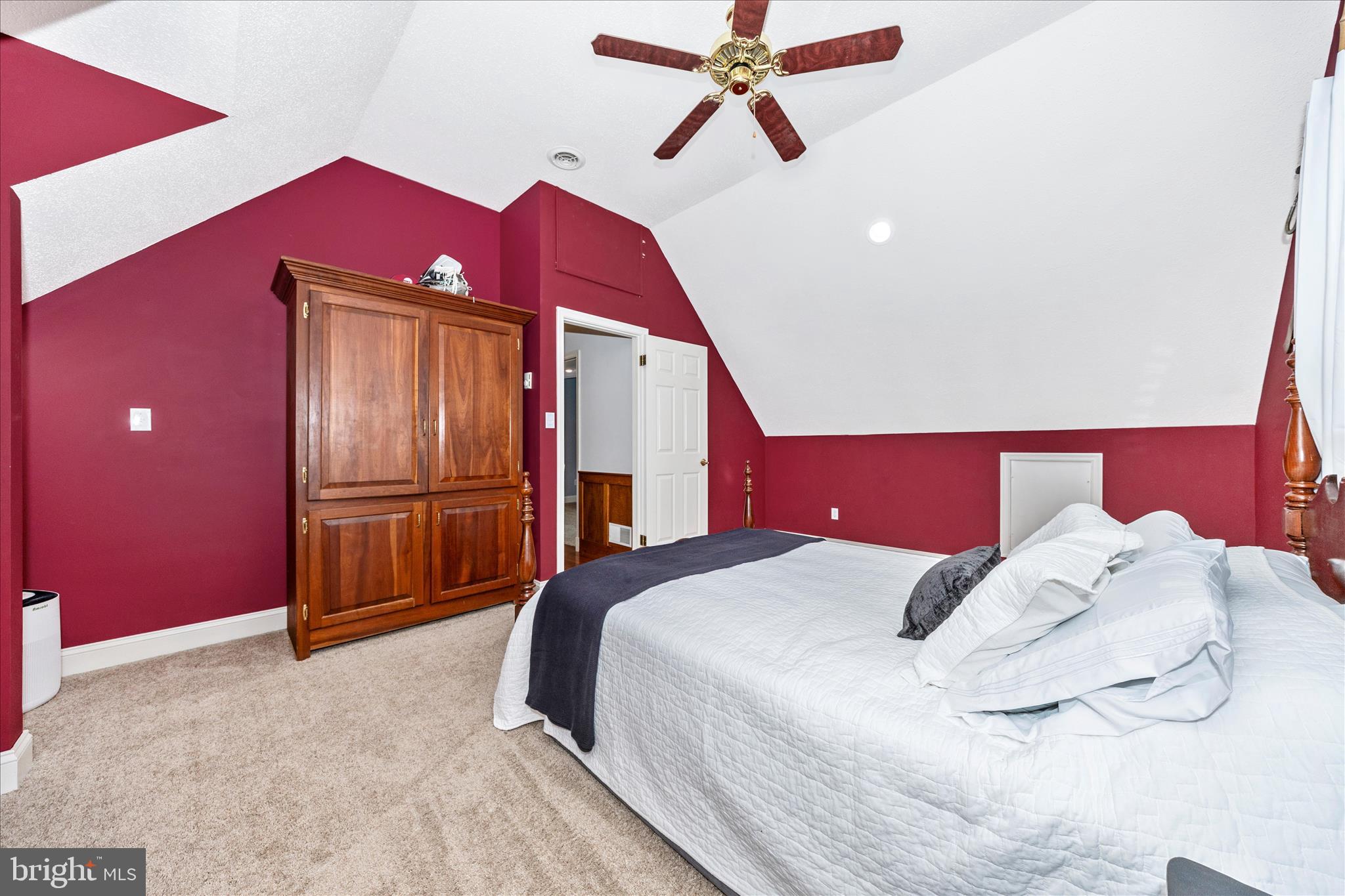 15810 Spade Road Hagerstown, MD 21740 - Photo 27 of 76 a bedroom with a bed and a chandelier