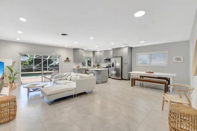 a living room with furniture and a table