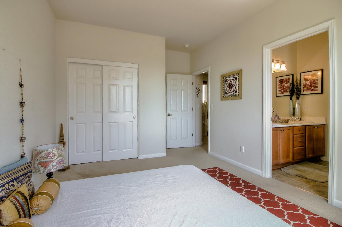 692 Gale Drive Campbell, CA 95008 - Photo 11 of 23 a bedroom with a bed and a view of bathroom