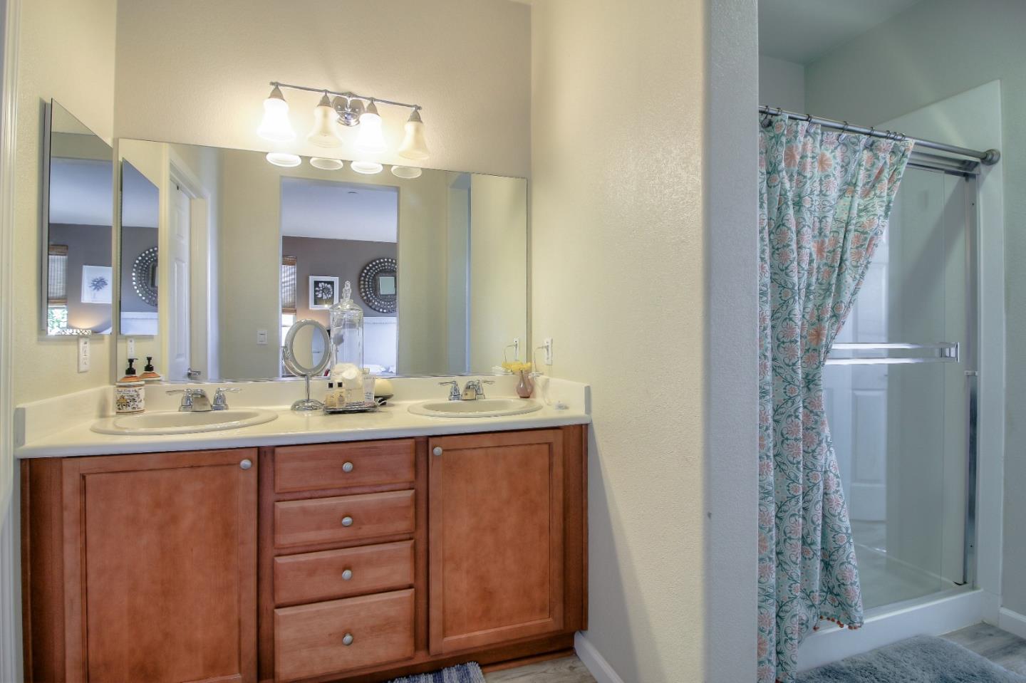 692 Gale Drive Campbell, CA 95008 - Photo 15 of 23 a bathroom with a double vanity sink and mirror
