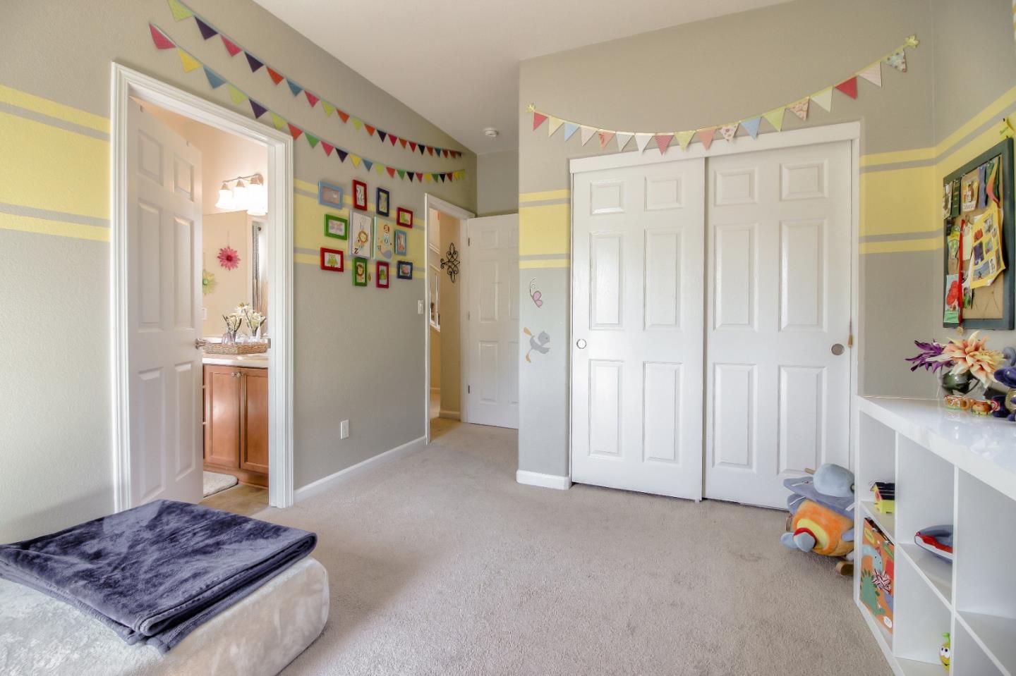 692 Gale Drive Campbell, CA 95008 - Photo 9 of 23 a spacious bedroom with a bed and a window