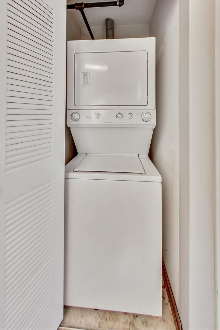1830 Ridge Avenue, Unit 5C Evanston, IL 60201 - Photo 10 of 11 a close up view of a washer and dryer