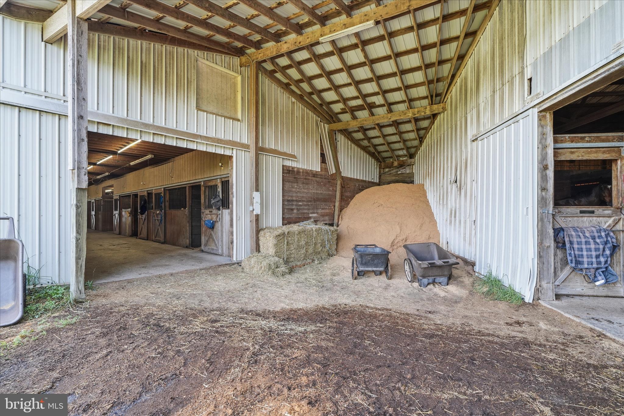 20800 Whites Ferry Road Poolesville, MD 20837 - Photo 20 of 94 Convenient shavings and hay storage