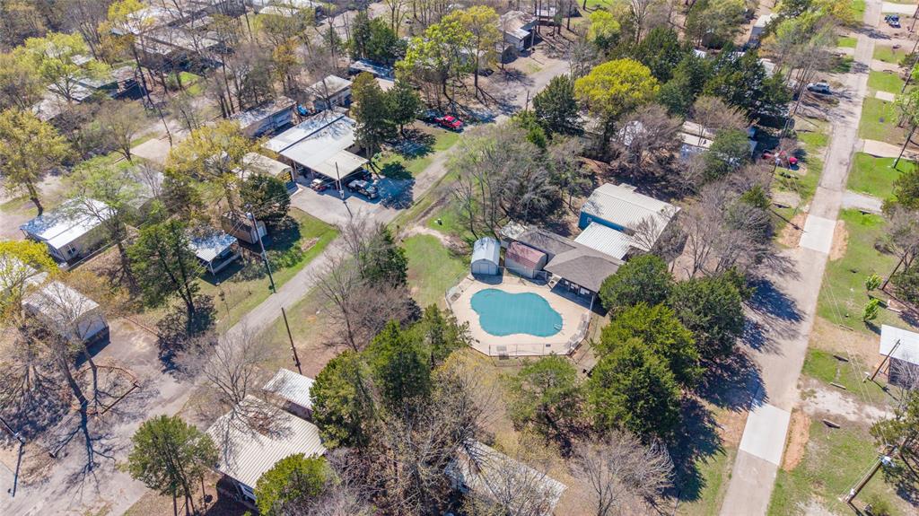 6435 FM 17, Unit 3435 Yantis, TX 75497 - Photo 9 of 14 an aerial view of a house with a swimming pool