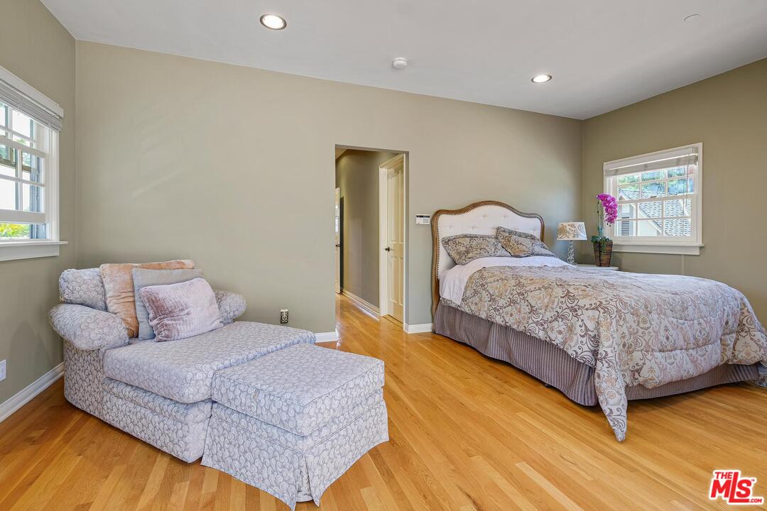323 9th Street Santa Monica, CA 90402 - Photo 11 of 16 a bedroom with a bed and a night stand