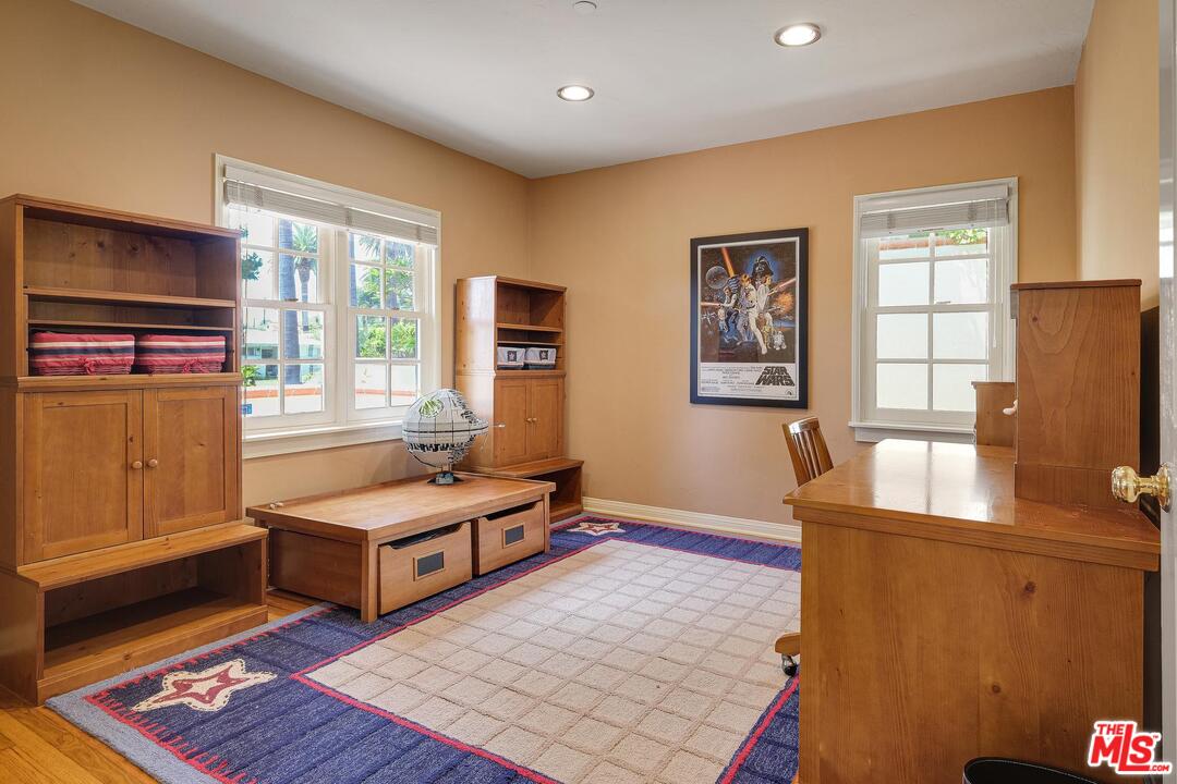 323 9th Street Santa Monica, CA 90402 - Photo 8 of 16 a living room with hard wood floors and a wooden floor