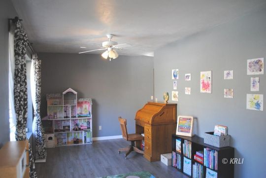 595 Evans Road Wofford Heights, CA 93285 - Photo 18 of 43 a view of a workspace with furniture and wooden floor