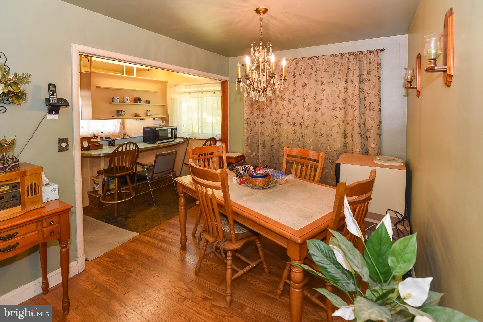 4428 Forge Road Perry Hall, MD 21128 - Photo 5 of 27 a view of a dining room with furniture window and outside view