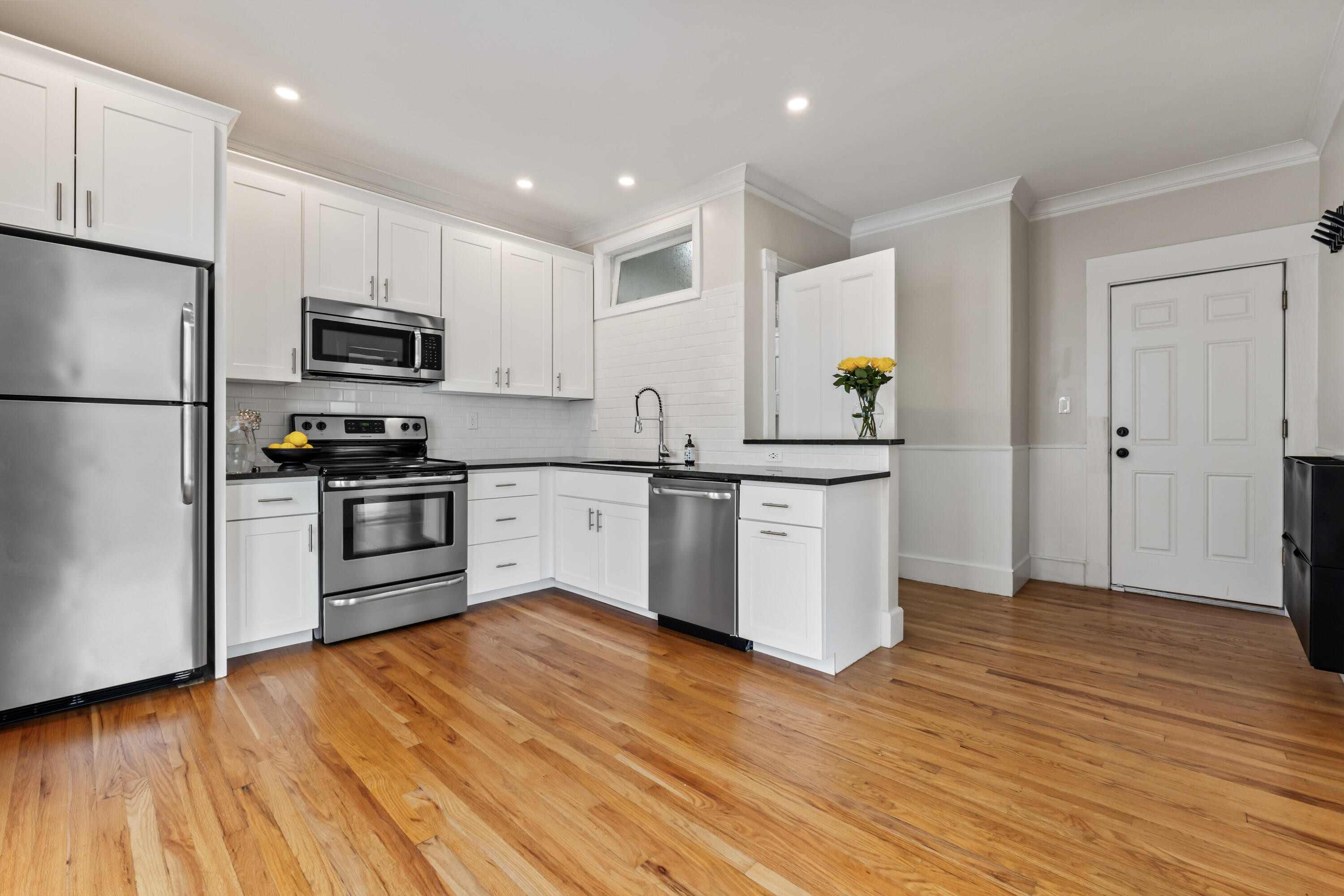 773 Congress Street, Unit 3 Portland, ME 04102 - Photo 1 of 13 sunny and bright kitchen with granite