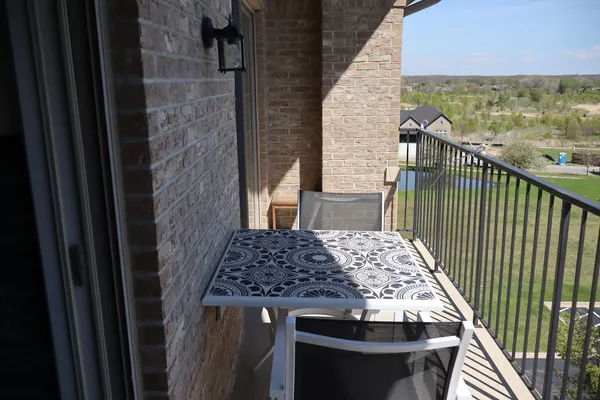 $355,000 | 14160 Sheffield Drive, Unit 404, Homer Glen, IL 60491