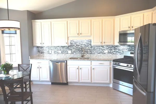 $355,000 | 14160 Sheffield Drive, Unit 404, Homer Glen, IL 60491
