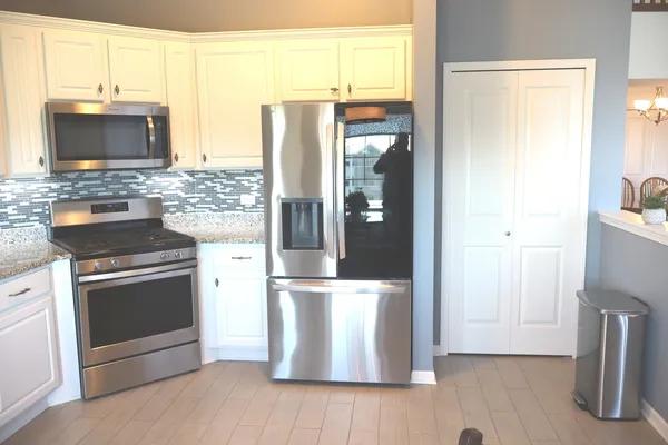 $355,000 | 14160 Sheffield Drive, Unit 404, Homer Glen, IL 60491