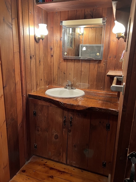 128 Danforth Street Rehoboth, MA 02769 - Photo 12 of 39 a bathroom with a sink and a mirror