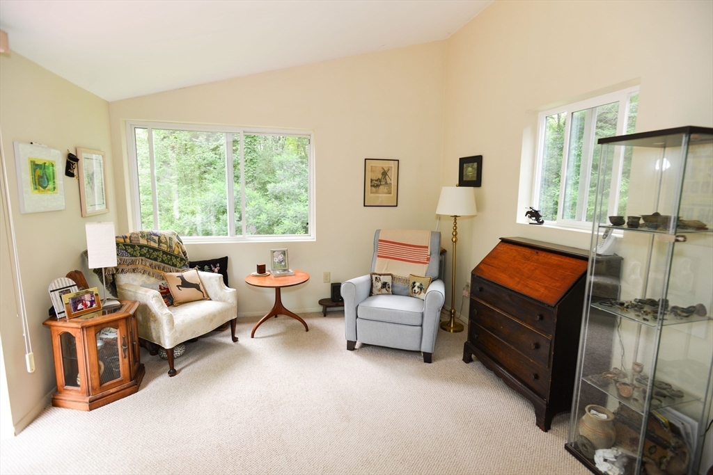 128 Danforth Street Rehoboth, MA 02769 - Photo 18 of 39 a living room with furniture and a flat screen tv