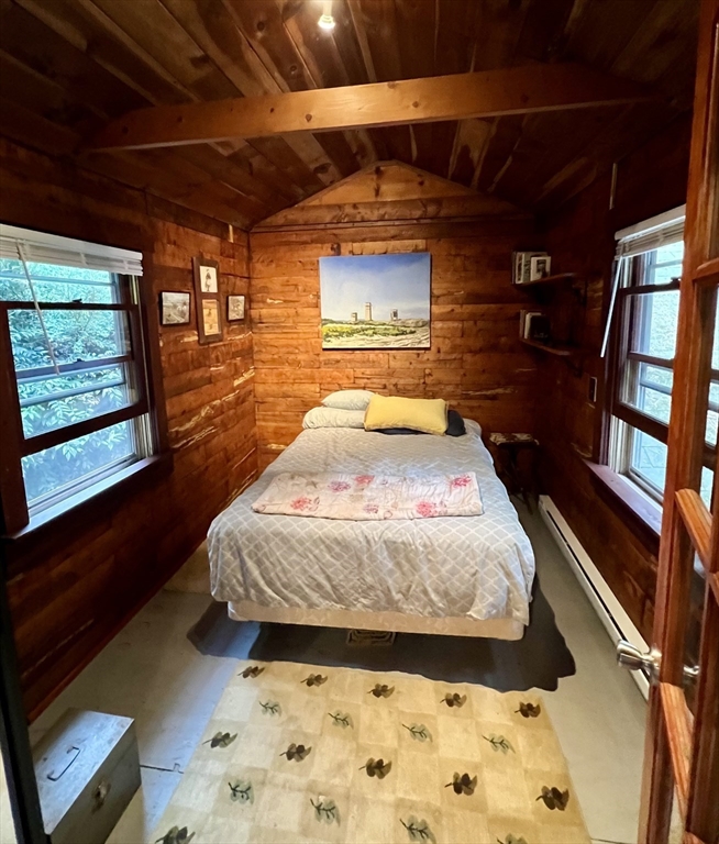 128 Danforth Street Rehoboth, MA 02769 - Photo 28 of 39 a bed sitting in a room next to a window