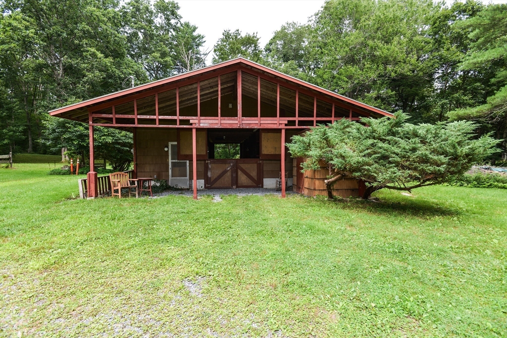128 Danforth Street Rehoboth, MA 02769 - Photo 34 of 39 a front view of a house with garden