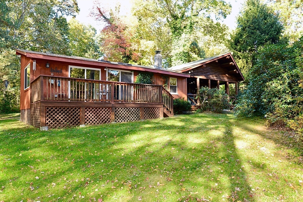 128 Danforth Street Rehoboth, MA 02769 - Photo 4 of 39 a view of a house with a roof deck