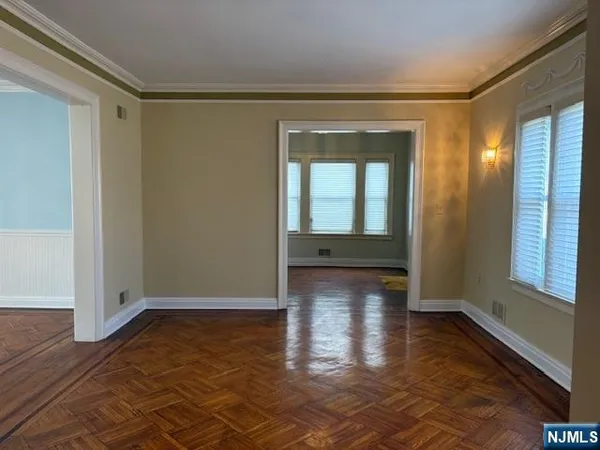 a view of livingroom with hardwood floor and hallway